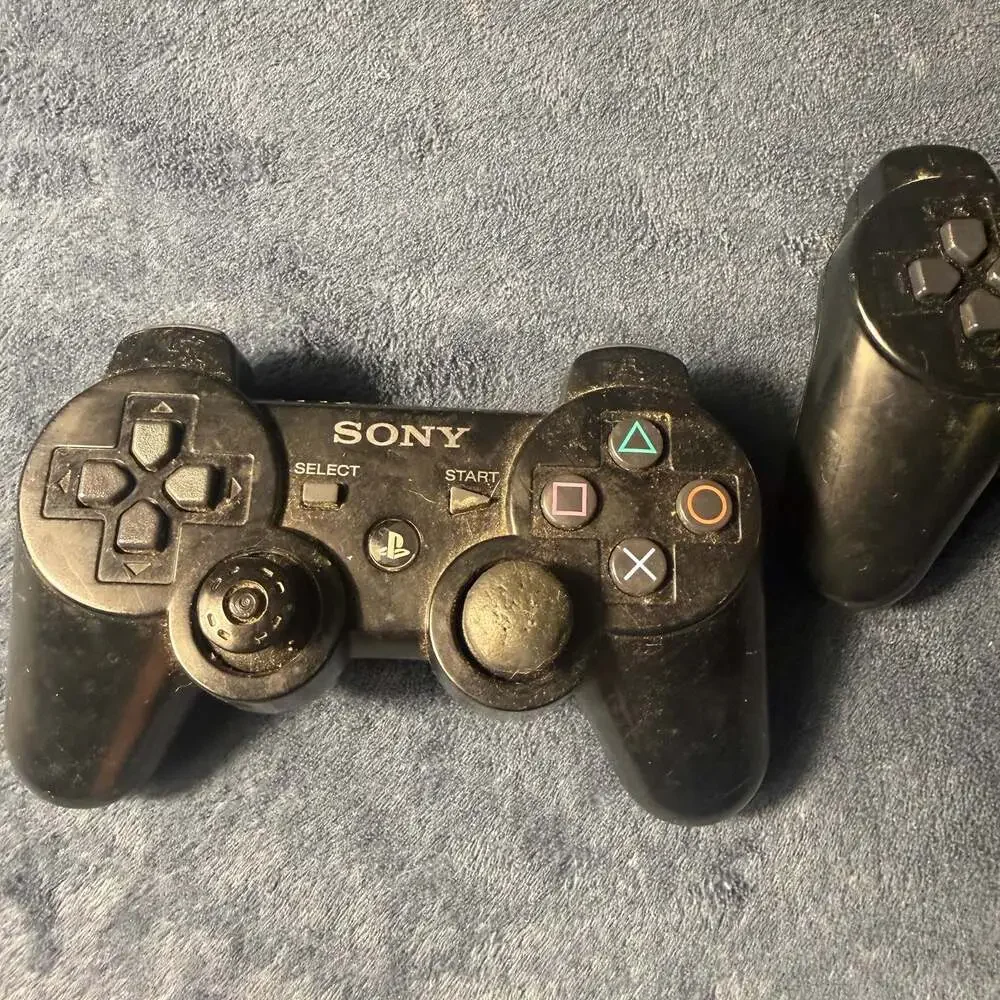 Sony PlayStation 3 Slim CECH-3001A Charcoal Black Console with Two Controllers